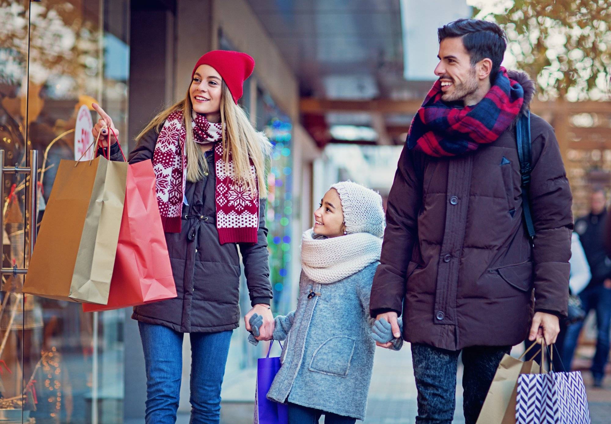 Young couple is shopping at Christmas Young couple is shopping at Christmas